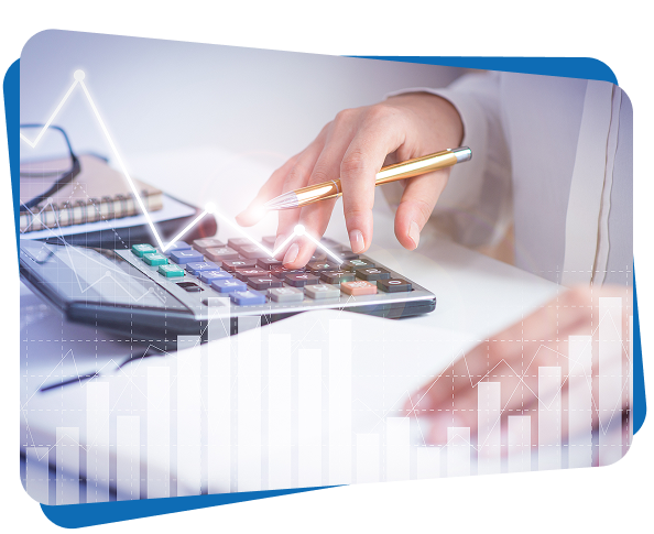 Hands using a calculator with business paperwork